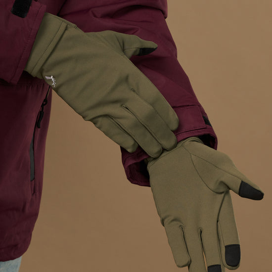 Olive green gloves with black touchscreen fingertips and wrist closures