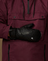 Black leather mitten with a gathered wrist cuff and small logo patch.