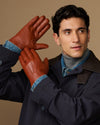 Men's cognac leather gloves raised, blue lambswool lining at cuffs