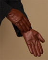Cognac leather glove palm and fingers with stitched seams and fleece-lined cuff
