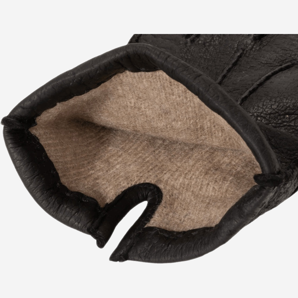 Women's black leather gloves with cashmere lining visible at open cuff