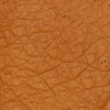 Close-up of cognac pebbled leather texture for gloves