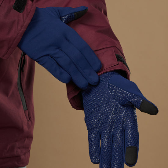 Blue activity gloves showing textured grip palms and touchscreen fingertips