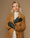 Dark green leather gloves with silk lining, touchscreen tips, and snug fitted cuffs