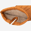 Cognac brown peccary leather glove open cuff, showing soft cashmere lining