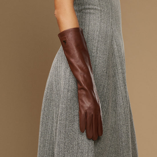 Women's brown below-elbow leather gloves, fitted cuffs with touchscreen detail
