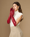 Red leather elbow gloves with smooth finish and long cuffs