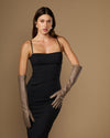 Taupe lambskin elbow-length leather gloves on model, full stance view